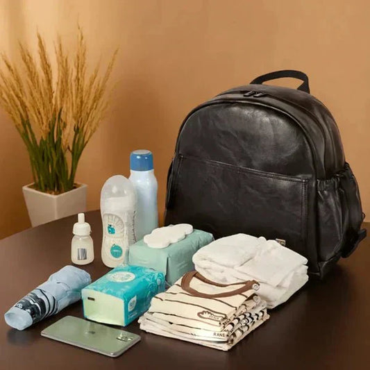 Que mettre dans un sac à langer de luxe ? (Liste complète et conseils pratiques) - Paradis de Bébé