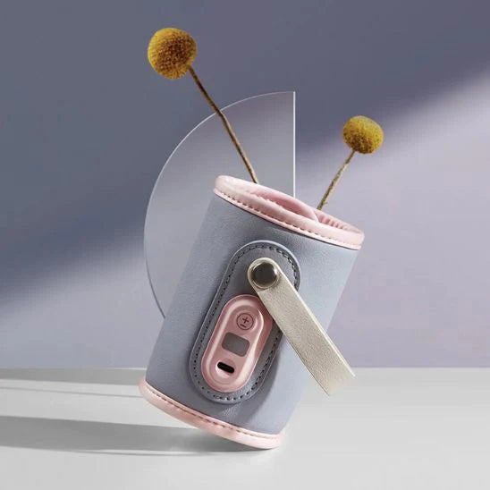Chauffe biberon rechargeable USB rose compact et portable idéal pour les sorties et voyages avec bébé