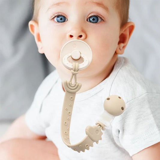 Attache tetine en silicone beige attachement solide et sécurisé