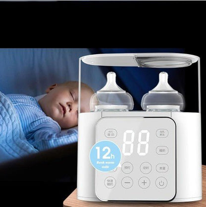 Bébé endormi tranquillement grâce au chauffe biberon gardant le biberon chaud pendant 12 heures