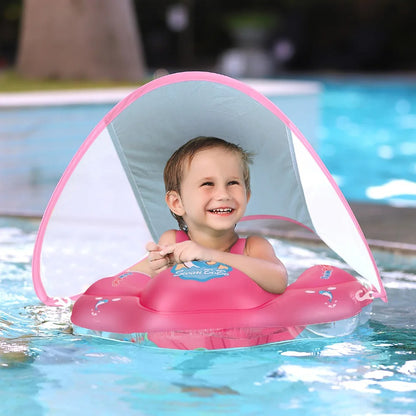 Bouee bebe rose foncé avec ombrelle anti uv  dans piscine protection solaire efficace