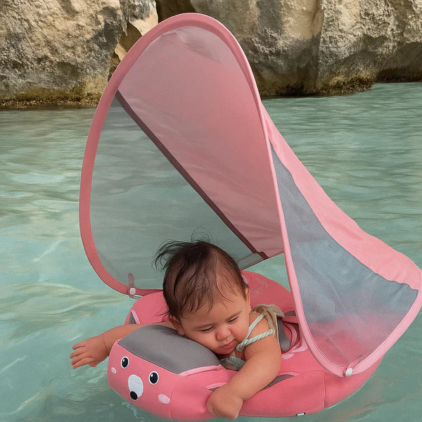 Bouée bébé rose avec ombrelle anti UV pour piscine et plage avec protection solaire efficace