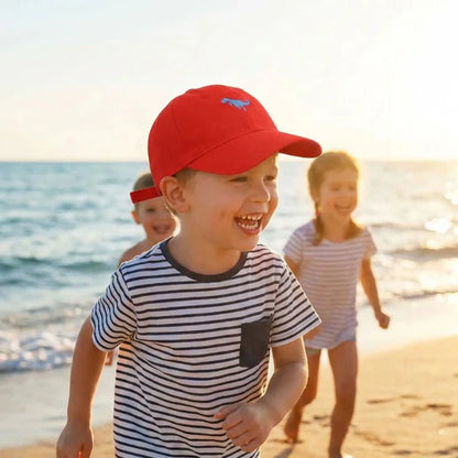 Casquette bébé rouge avec motif dinosaure, idéale pour la plage et les sorties ensoleillées