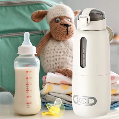Chauffe biberon nomade portable blanc modèle pratique avec alimentation usb et plusieurs niveaux de température