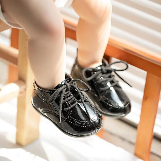 Chaussure bebe noire élégante avec languette rembourrée