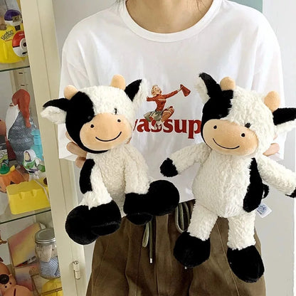 peluche doudou vache douce pour bébé idéale pour les calins