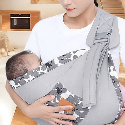 écharpe de portage bébé grise avec motif fleur confortable et sécurisée pour maman