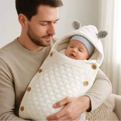 Nid d'ange cosy blanc chaud offrant confort et douceur pour bébé