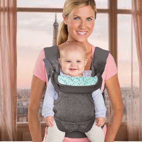 Porte bebe gris permettant le portage face au monde, sécurisé pour bébé et maman