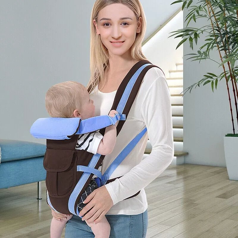 porte bébé physiologique noir et bleu en portage face à maman moment plein d'amour avec bébé