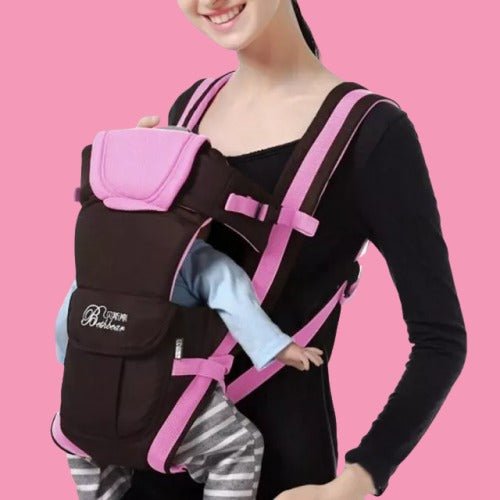 Porte bébé physiologique rose et noir style kangourou offrant confort et maintien pour bébé