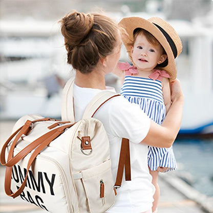 sac à langer bébé mommybagtrio porté par une maman stylée et moderne
