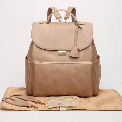 Sac a langer luxe en cuir beige chic grande capacité, organisé pour bébé