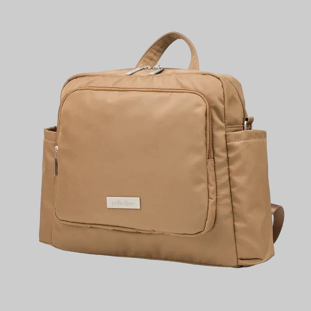 Sac à langer luxe en tissu imperméable et anti-tache, conçu pour résister 