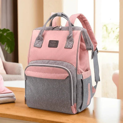 Sac a langer multicolore gris et rose élégant et tendance pour parents organisés