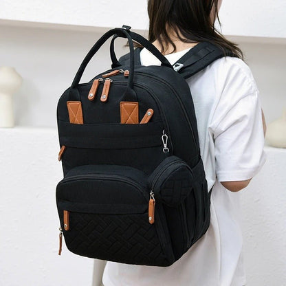 Sac a langer noir élégant et fonctionnel avec multiples poches pour parents organisés