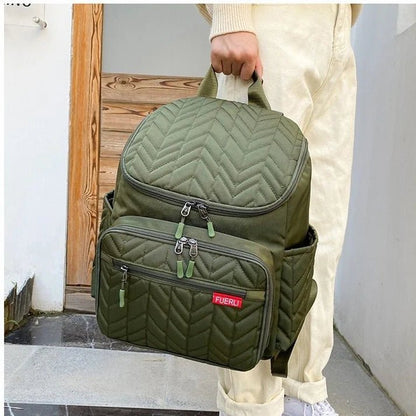 Sac à langer chic vert confortable et élégant idéal pour les mamans modernes 