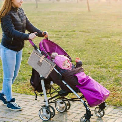tapis à langer nomade léger avec attache pour poussette pratique et transport facile