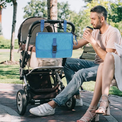 Tapis à langer nomade bleu avec attache poussette pratique et compact pour les sorties avec bébé