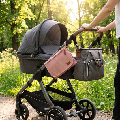 Tapis à langer nomade rose transportable facile à accrocher à une poussette